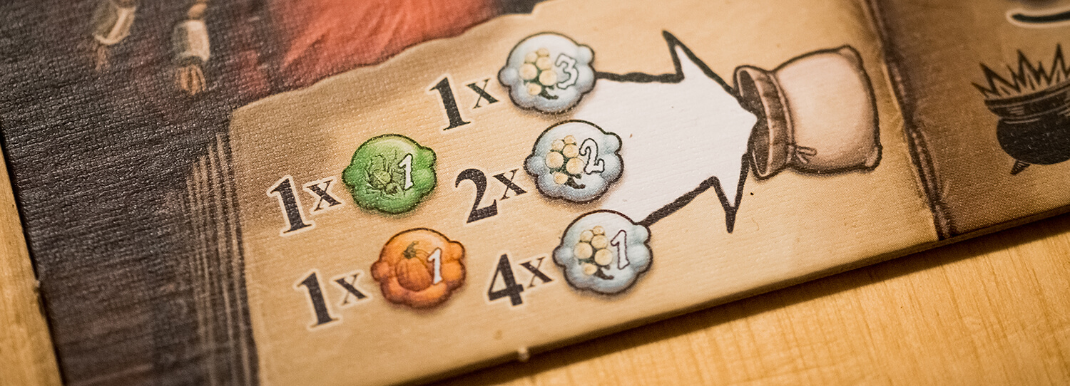 Graphic design on the player boards in Quacks of Quedlinburg